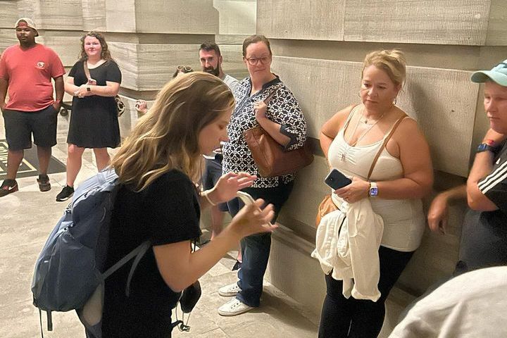 a group of people that are talking to each other