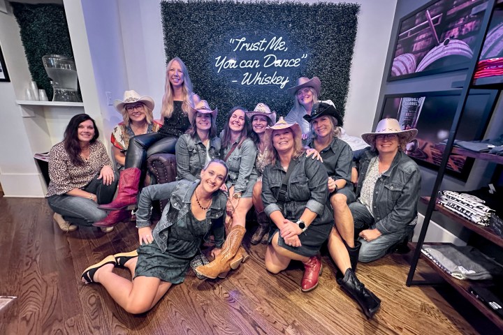 cowgirls posing at nashville barrel co