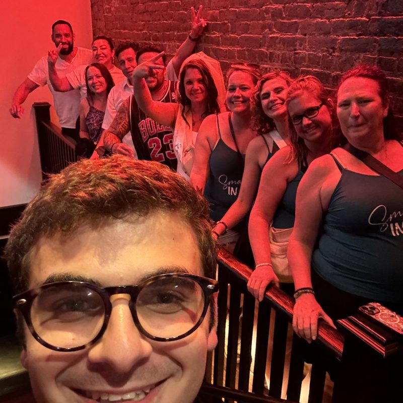 a group of people posing for the camera