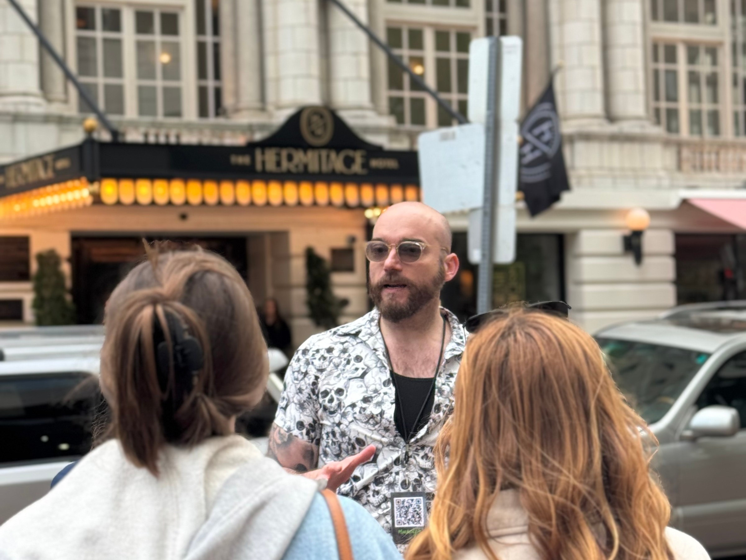 a group of people standing in front of a building