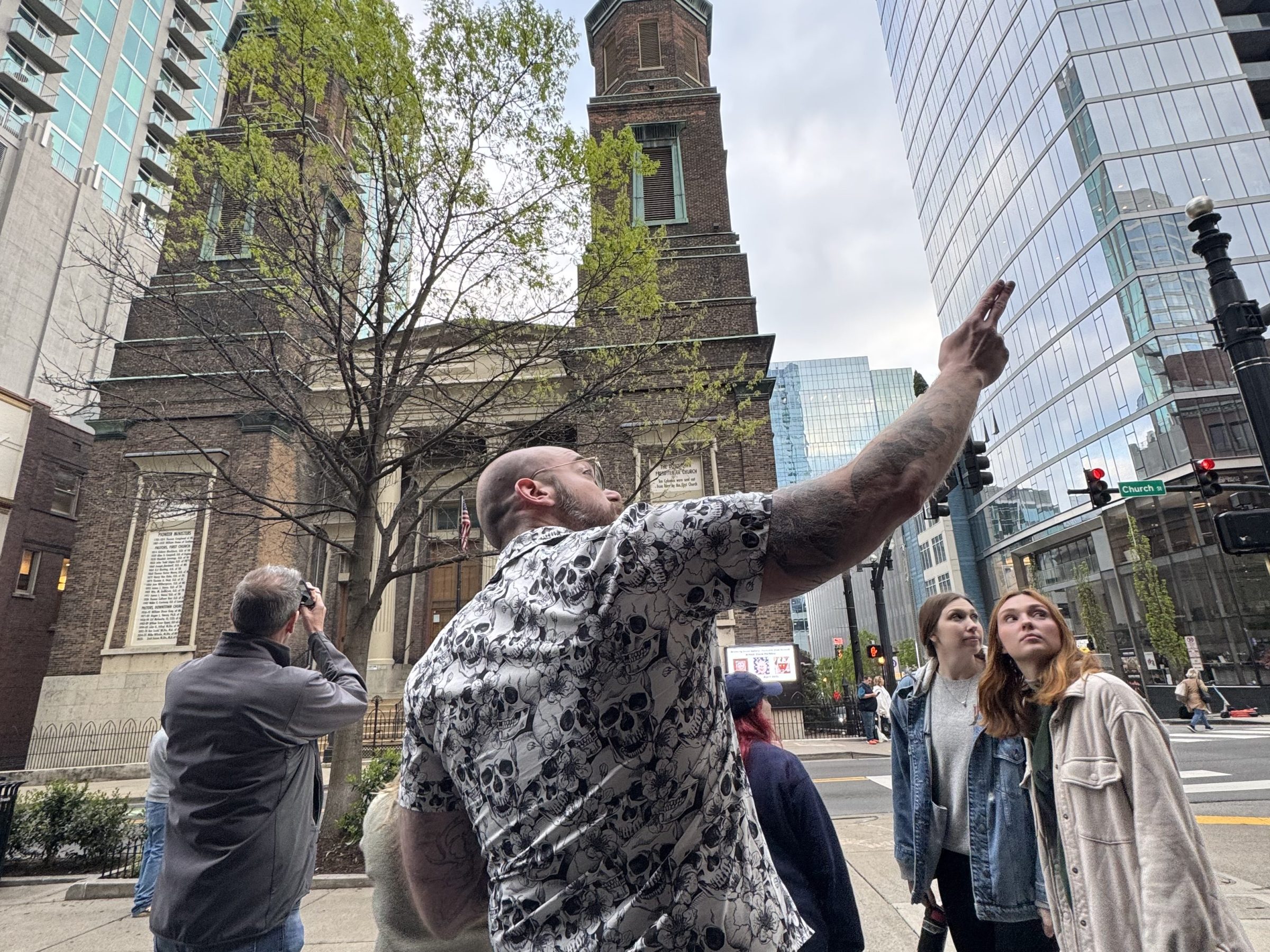 a group of people standing in front of a building