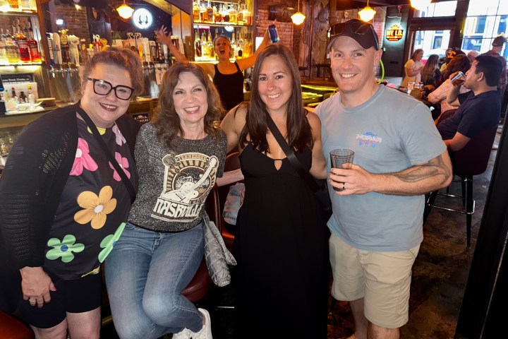 a group of people posing for the camera