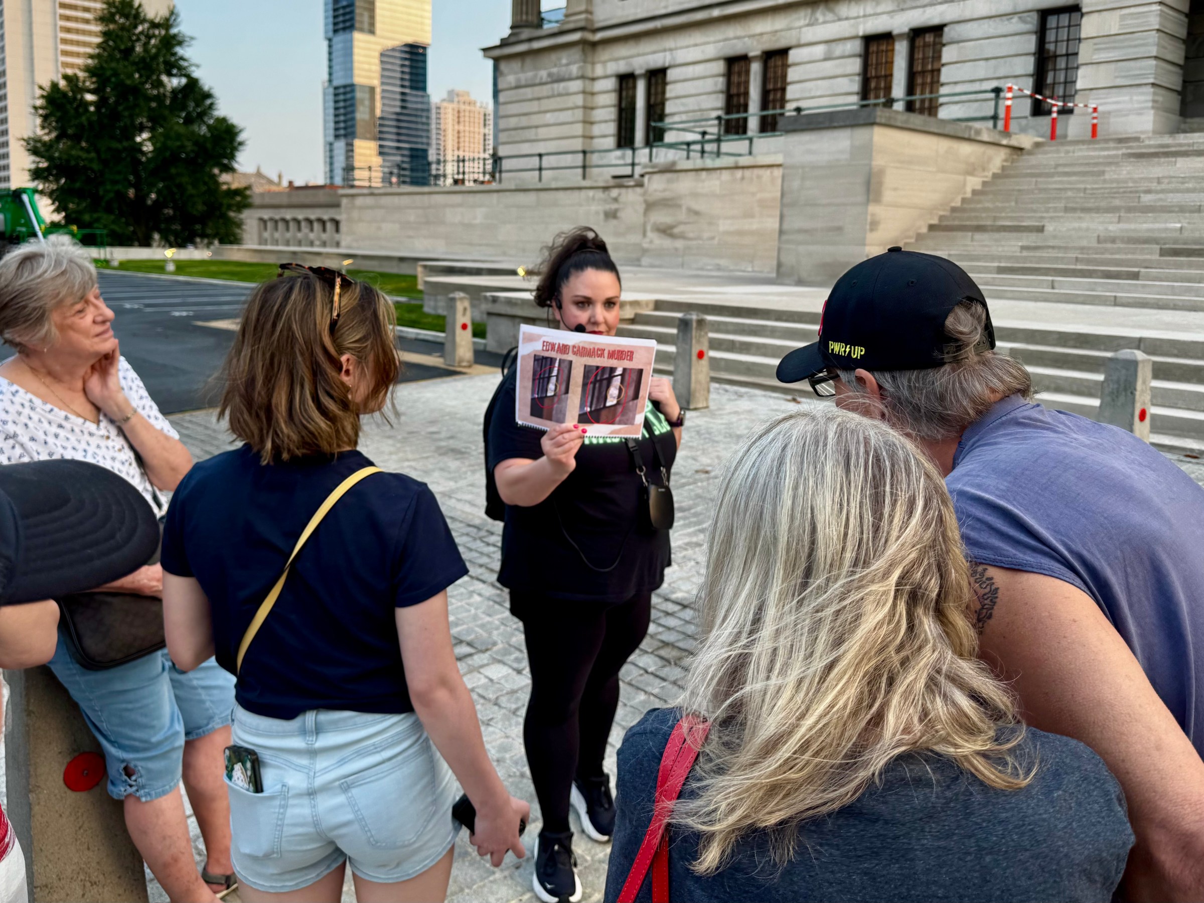 a group of people standing in front of a building