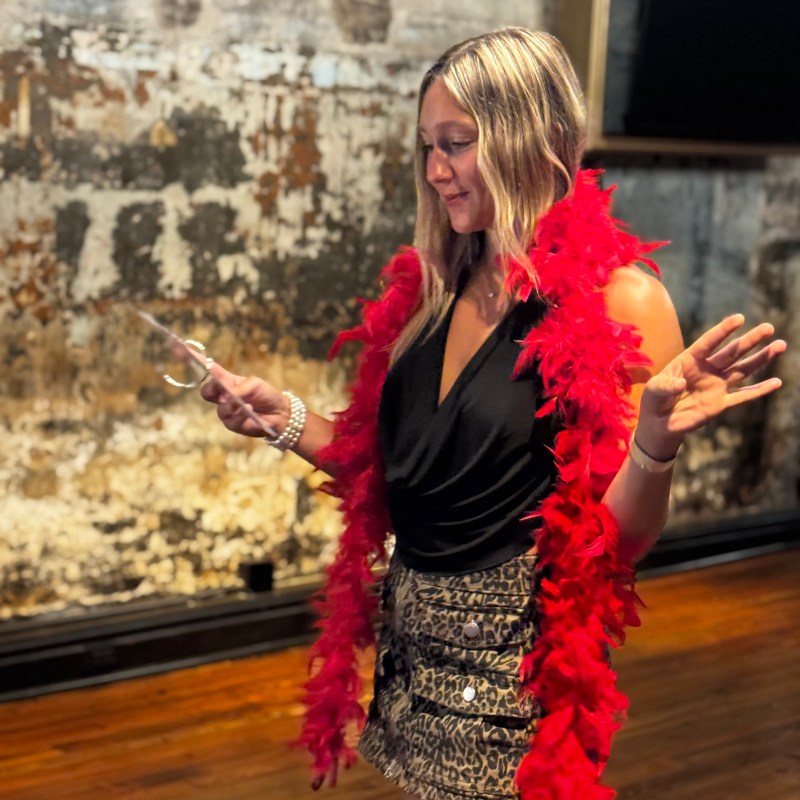 a woman standing in front of a building