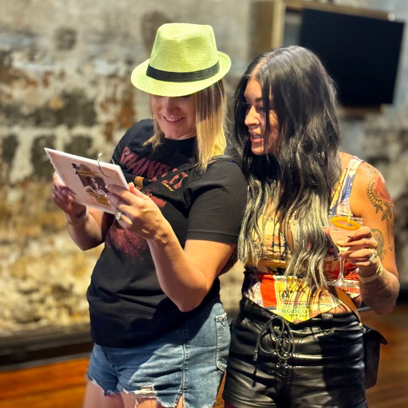 a woman holding a cell phone