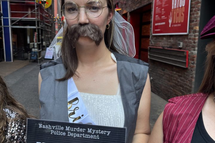 a person holding a sign