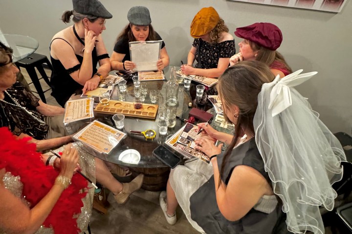 a group of people around each other