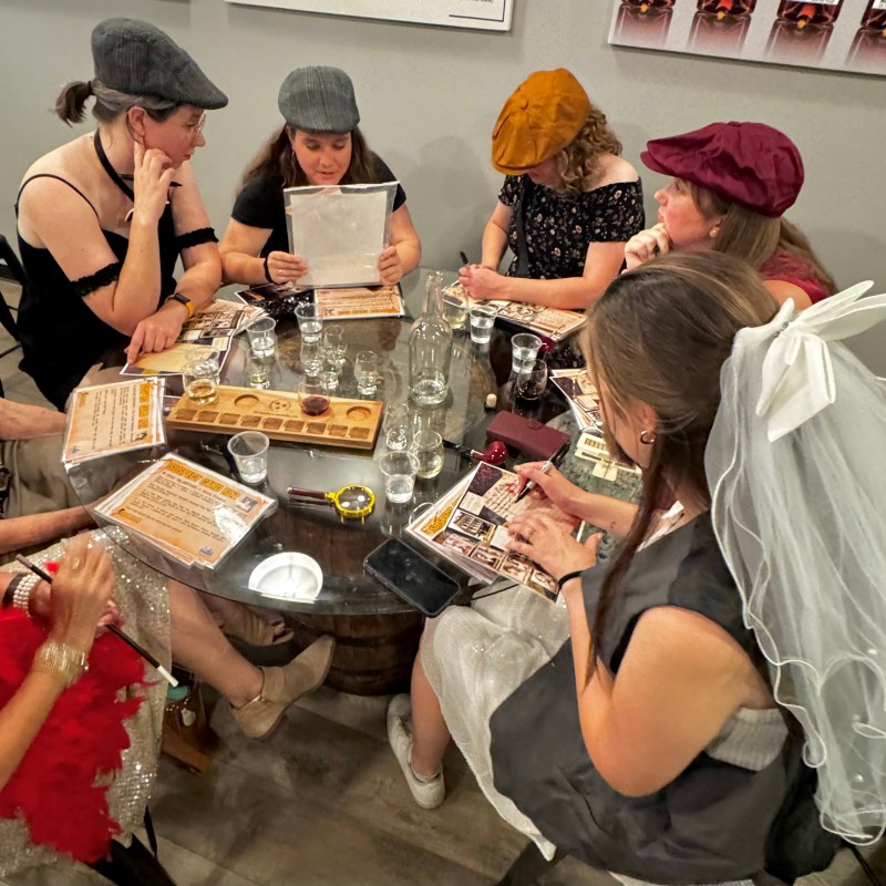 a group of people around each other