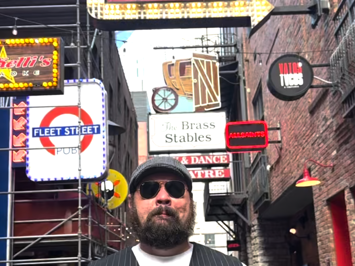 a man holding a sign