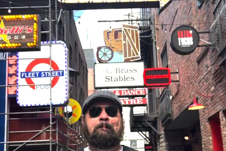 a man holding a sign