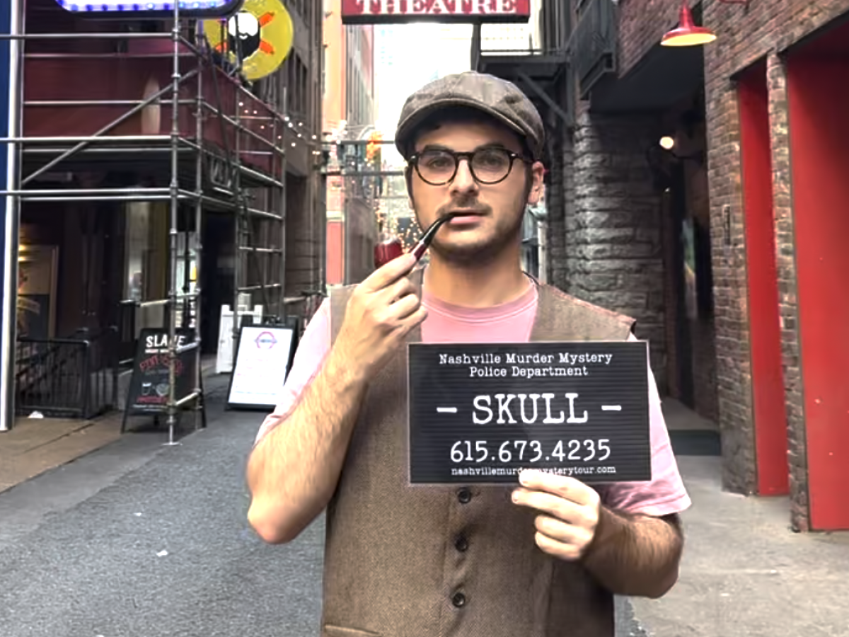 a person holding a sign