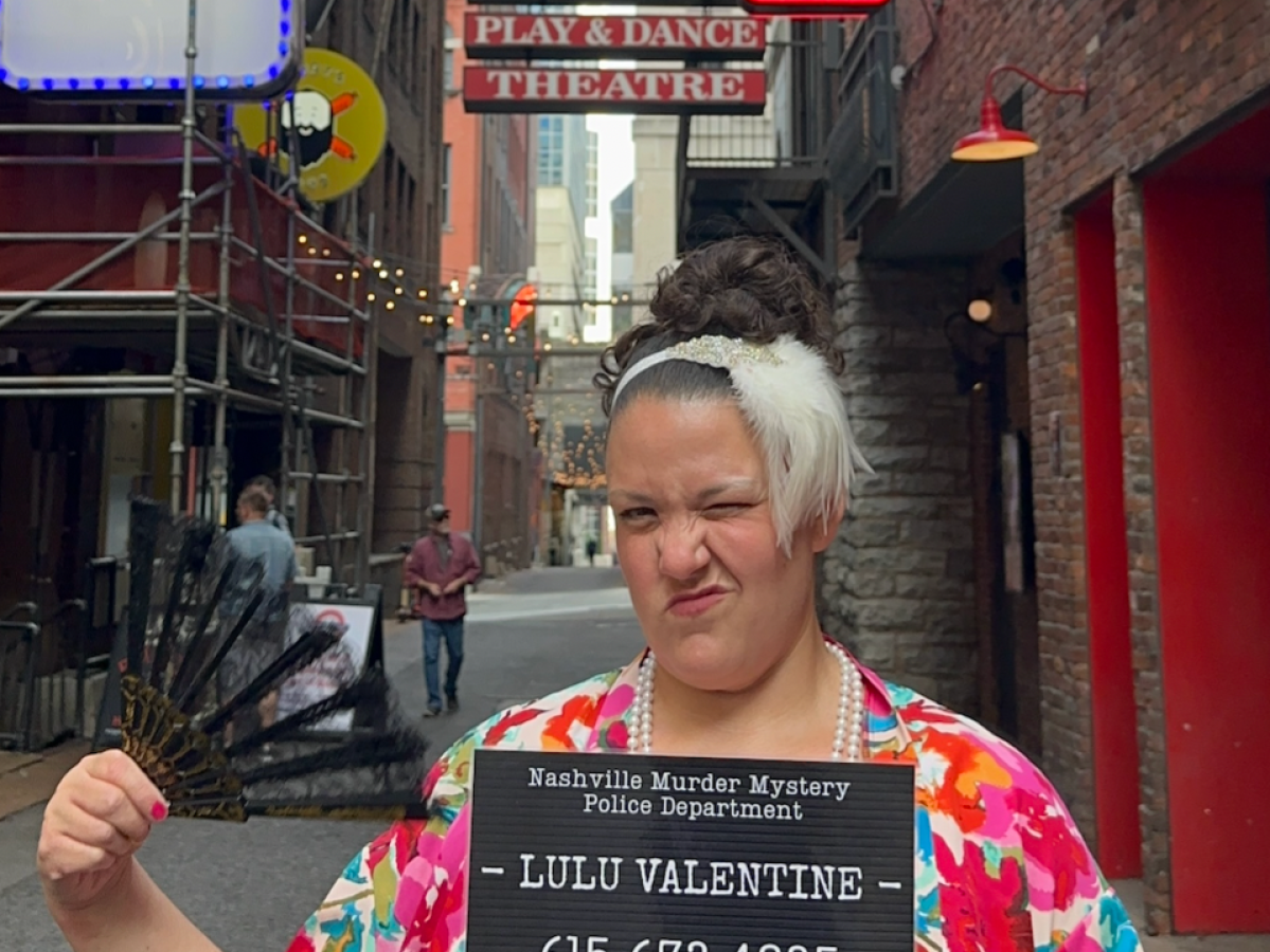 a person holding a sign